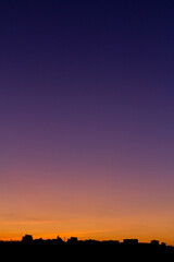 Beautiful black silhouette of a city during sunset, golden hour