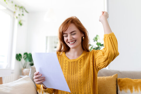 Excited Young Woman Hold Paper Letter Feel Euphoric Receiving Job Promotion Or Tax Refund From Bank, Happy Woman Reading Paperwork Document Smiling Of Good Pleasant News, Getting Student Scholarship