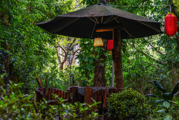 Traditional stilted pavilion in a Chinese abandoned garden