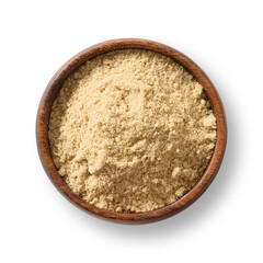 Sesame flour in wooden bowl on white background. View from above.