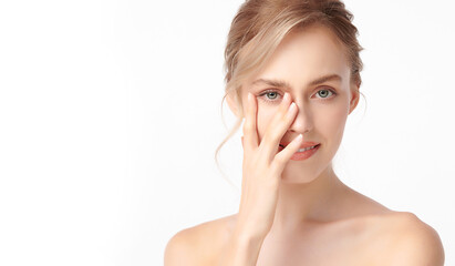 Fototapeta premium Beautiful young woman with clean fresh skin on white background, Face care, Facial treatment, Cosmetology, beauty and spa, women portrait.