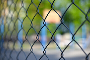 Fototapeta premium Перейти к странице|123456Далееchain link fence against a basketball court