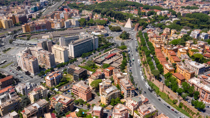 Aerial view of Ostiense square and Pyramid of Cestius, a Roman Era pyramid located in Rome, Italy. 