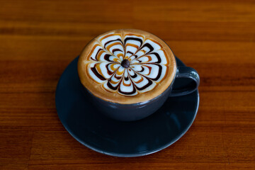 hot latte art coffee on table, relax time