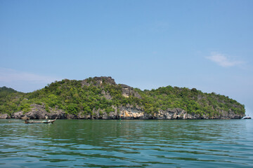 Limestone mountain island in sea ocean for thai people travelers travel visit local trip tour Prasat Hin Pan Yod of Mu Ko Petra National Park in Pak Bara waterfront at La ngu city in Satun, Thailand