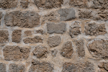 Old stone wall. Vintage stonework background