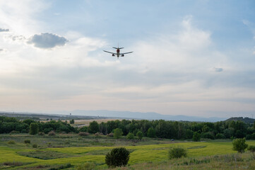 Fototapeta na wymiar Planes take off over the prairie