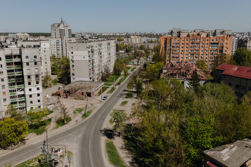 Fototapeta na wymiar Chernihiv Ukraine 2022: destroyed buildings after the air strike. Aerial photo. Ruins during Russia's war against Ukraine.