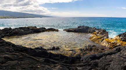 Fototapeta na wymiar Tide Pool On The Volcanic Shoreline of Keiki Beach, Kailua-Kona, Hawaii Island, Hawaii, USA