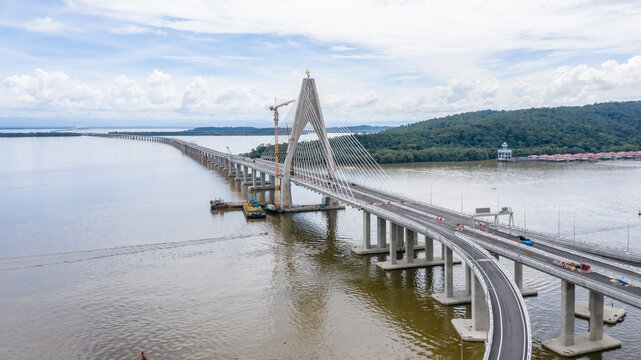 Temburong Bridge is a 30-kilometre (19-mile) bridge currently under construction in Brunei. It will connect Mengkubau and Sungai Besar in Brunei-Muara District and Labu Estate in Temburong District.