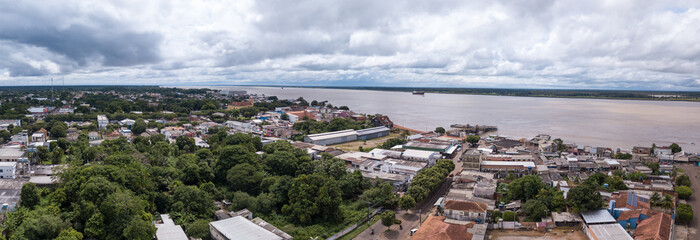 Beautiful drone aerial view of Amazonas river and Itacoatiara city skyline in the Amazon...