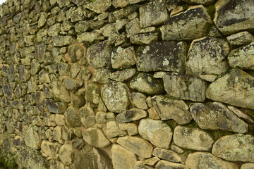 Inca wall in the village Machu-Picchu close-up, Peru, South America