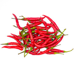 Heap of fresh green chilli on white background. Spot focus.