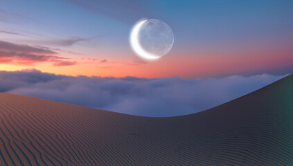 Scenic full crescent moon rise with colorful blue, red sunset sky over  sand dune