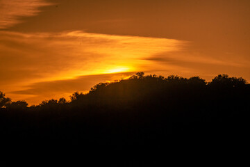Fototapeta na wymiar Sunset behind a hill in Topanga Canyon