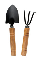 Garden shovel and rake isolated on white background. Tools for gardening or planting at home