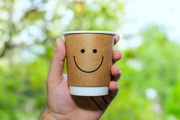 cup of coffee with a smiley face