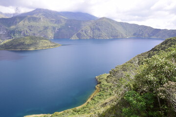 Naklejka na ściany i meble Laguna Cuicocha, beautiful blue lagoon with islands inside the crater of the Cotacachi volcano