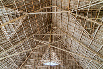 Roof of cafe made of wood and palm leaves. Nungwi, Zanzibar, Tanzania