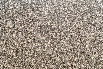 Granite stone wall texture pattern of natural mineral rock background