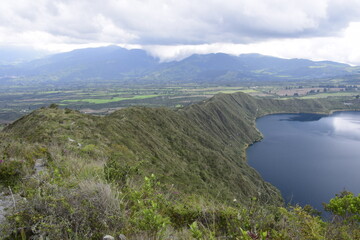 Fototapeta na wymiar Laguna Cuicocha, beautiful blue lagoon with islands inside the crater of the Cotacachi volcano