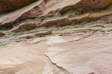 stone texture,rusted granite texture Rusted stone background. Granite. Old colors, cracks, rust, rough texture. Background of reddish brown rough textured stone wall. grunge abstract stone texture