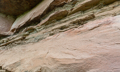 stone texture,rusted granite texture Rusted stone background. Granite. Old colors, cracks, rust, rough texture. Background of reddish brown rough textured stone wall. grunge abstract stone texture