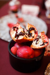 Pomegranate slices on the wedding table