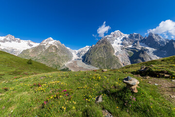 Summer trekking day in the mountains of Val Veny, Courmayeur - obrazy, fototapety, plakaty