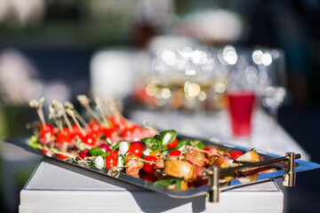 Canapes on a silver tray close up