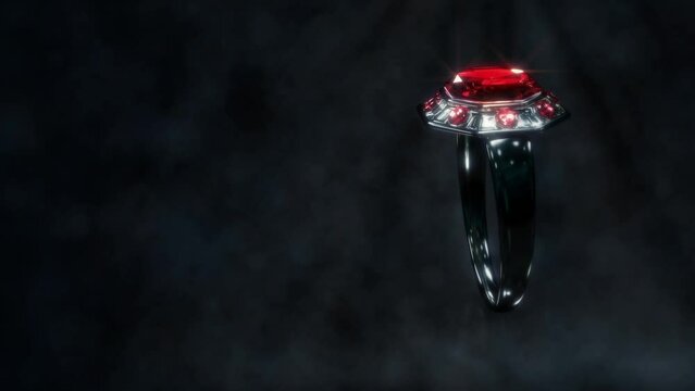 Shining dark metal ring with red ruby jewel rotate, fictive - loop video