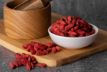 Goji berries isolated on white background. Red dry goji berries close up.