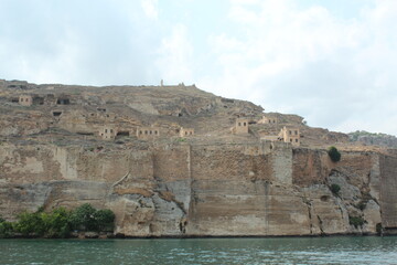 Halfeti Greek Castle, also known as "Hidden Paradise" and "Lost City" with its stone architecture under the Euphrates River, the sunken minaret and the surrounding landscape. Halfeti Şanlıurfa Turkey