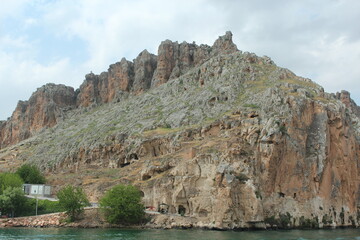 Halfeti Greek Castle, also known as "Hidden Paradise" and "Lost City" with its stone architecture under the Euphrates River, the sunken minaret and the surrounding landscape. Halfeti Şanlıurfa Turkey