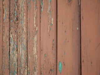 old boards, damaged and covered with paint background, pattern or wallpaper