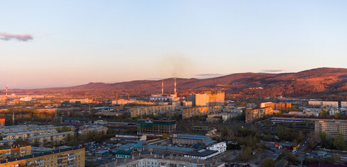 Obraz premium Panorama of the Siberian city of Krasnoyarsk. Mountains and Right Bank. Evening lighting