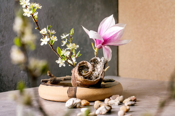 Spring ikebana with white flowers - 504236927