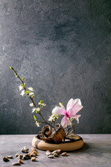 Spring ikebana with white flowers - 504236932