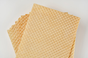 Stack of wafer or waffle sheets. Pattern wafle texture. Shallow depth of field. Top view