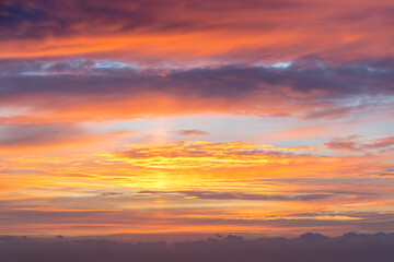 A delightful sunrise paints the sky in fiery colors