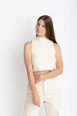 Young Woman dressing white on photo studio shooting - Confidence