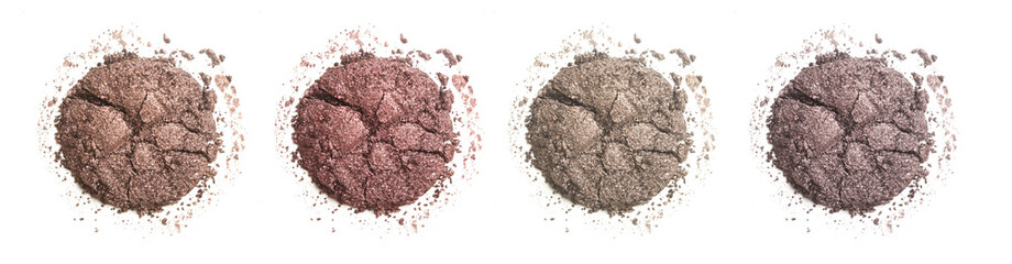 Smashed brown makeup samples isolated on white background	