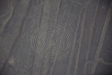 Nazca lines geoglyph spiral in desert Nasca plateau Peru.