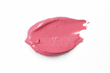 Pink ceamy makeup sample islated on white background. Decorative cosmetic smear.	