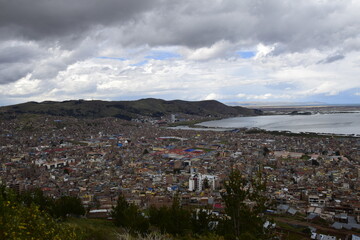 View from a high point of Lake Titicaca and the city of Puno, Peru