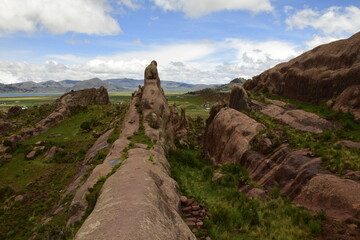 Fototapeta na wymiar Brown rocks near the Gate of Hayu Mark (The Gate of the Gods), Peru WILLKA UTA, HAYUMARKA GATE. Puno Peru