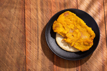 Rich fried dried fish torta - Traditional Colombian dish