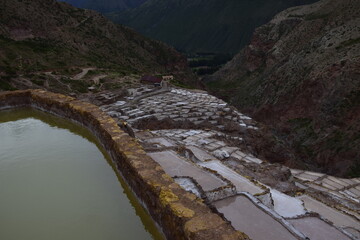 Fototapeta na wymiar Terraced salt pans also known as (Salineras de Maras), among the most scenic travel destination in Cusco Region, Peru