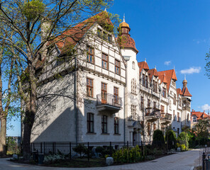 Old mansion in the garden in spring