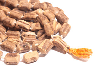 Rosary or prayer beads isolated on white background